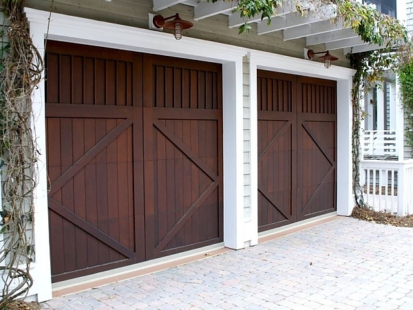 A door leading to a wooden door with a wooden frame. showcasing features like garage door services garage door repair garage door installation garage door spring repair new garage doors.