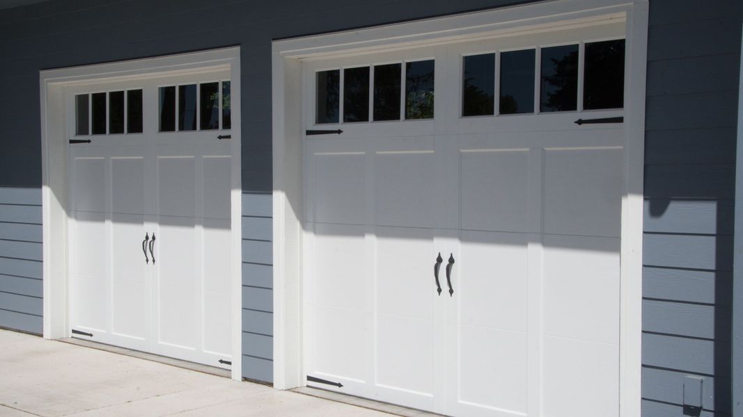 A door that is open to a building. showcasing features like garage door services garage door repair garage door installation.