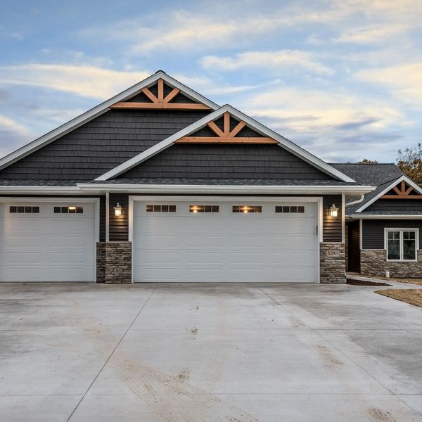 This scene from Lakewood, CO shows a large building with a large window. with features such as garage door services garage door repair garage door installation.