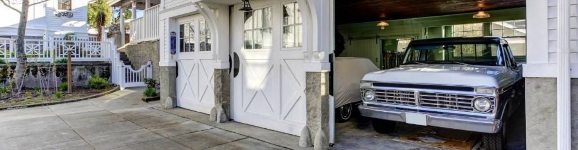 a hanging electrical cord hanging from a ceiling. features garage door services garage door repair garage door installation provided by Retrak Door Service.