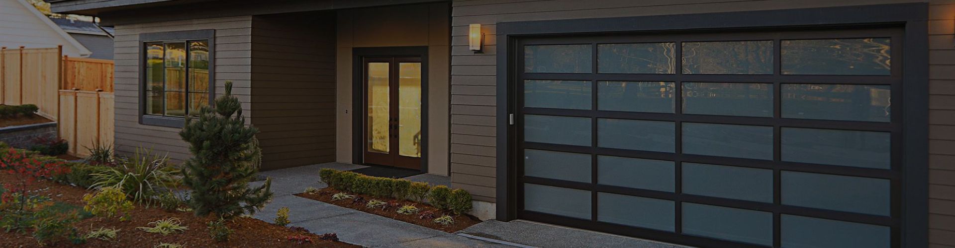 A house with a window and a house with a fence. showcasing features like garage door services garage door repair garage door installation garage door spring repair new garage doors.