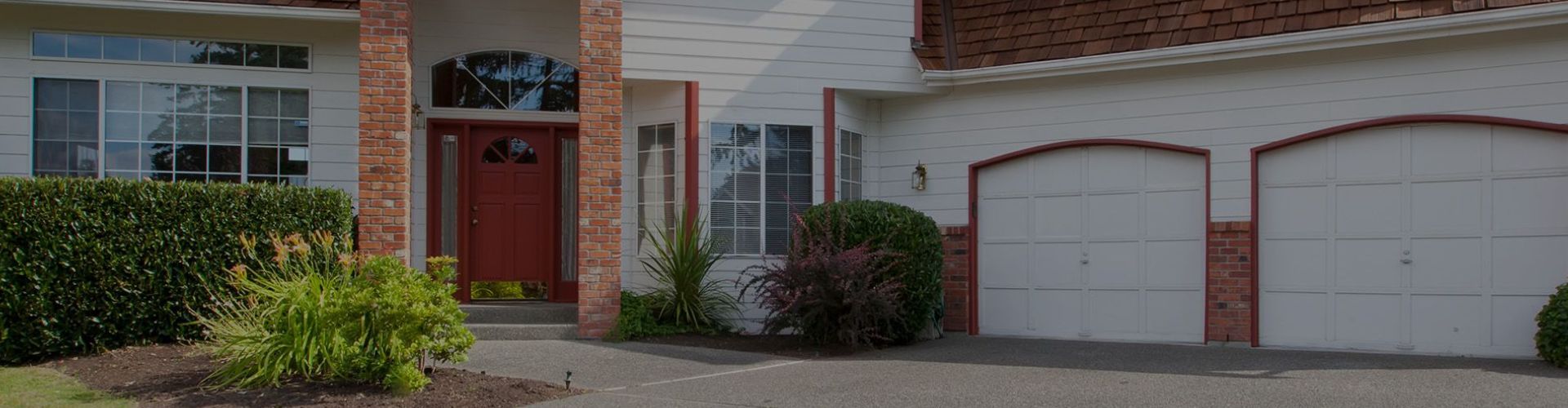 This scene from Lakewood, CO shows a house with a red door and a blue door. with features such as garage door services garage door repair garage door installation garage door spring repair.