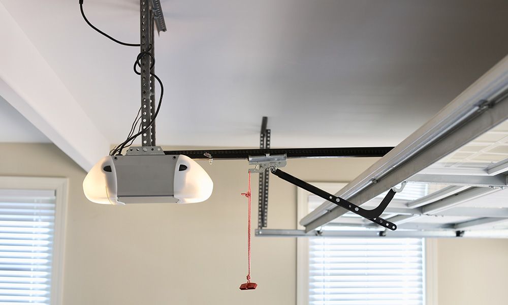 This scene from Lakewood, CO shows a kitchen with a ceiling fan and a hanging ceiling. with features such as garage door services garage door repair garage door installation garage door spring repair.